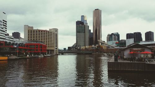 Buildings in city against sky