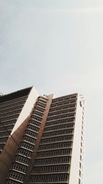 Low angle view of modern buildings against clear sky