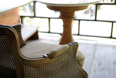 Close-up of chair on table at home