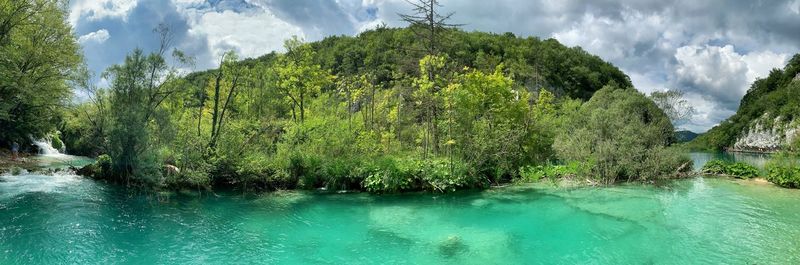 Panoramic view of swimming pool against sky