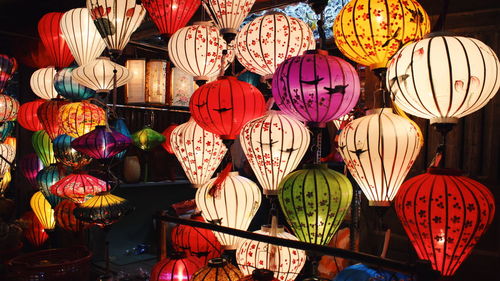 Multi colored lanterns hanging at market stall