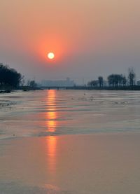 Scenic view of sunset over sea