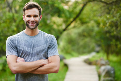 Portrait of young man standing outdoors