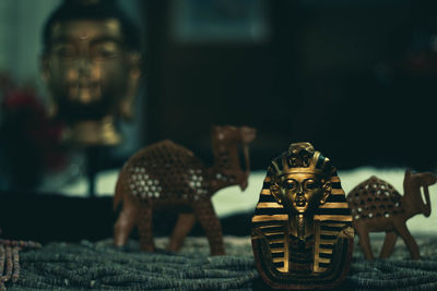 Close-up of figurine on table