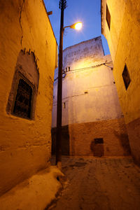 Low angle view of building against sky at night