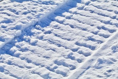 Full frame shot of snow covered land