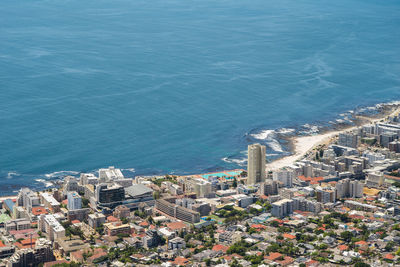 High angle view of cityscape by sea