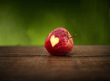 Close-up of apple on table