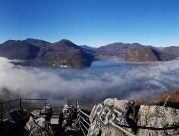 Scenic view of mountains against clear blue sky