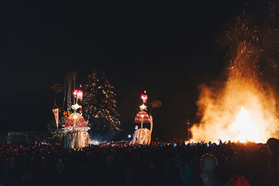 Crowd celebrating at night