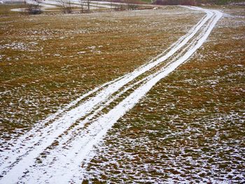 Tire tracks on snow field