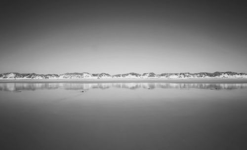 Scenic view of lake against clear sky