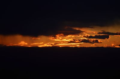 Scenic view of dramatic sky during sunset