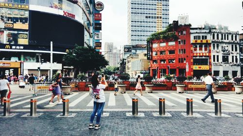 People walking on city street