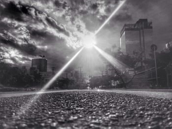 Sun shining over road