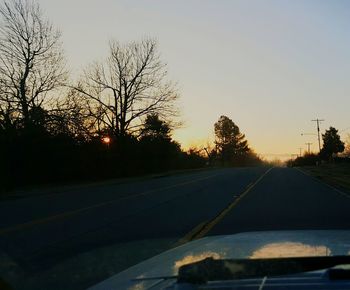 Empty road at sunset