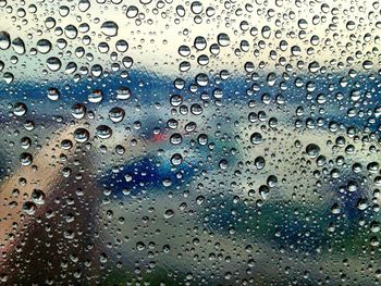 Close-up of water drops on glass