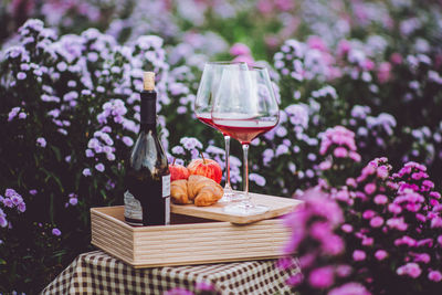 Glass of red wine on table