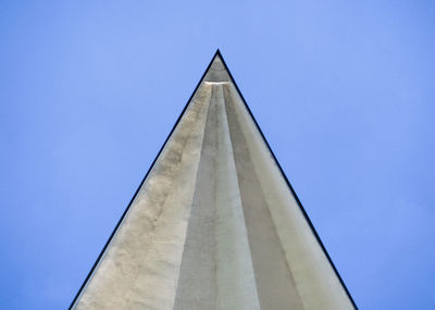 Low angle view of built structure against blue sky