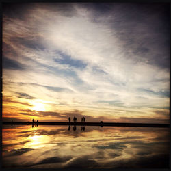 Scenic view of sea at sunset