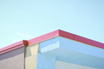 Low angle view of building against blue sky