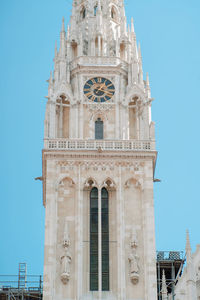 Low angle view of cathedral against blue sky