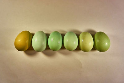 Close-up of green fruits on table