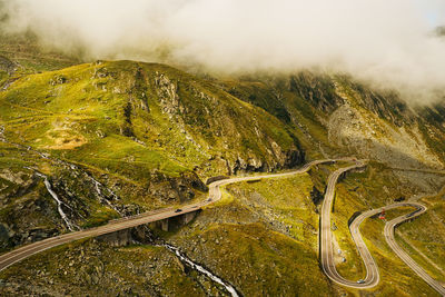 High angle view of winding road against sky