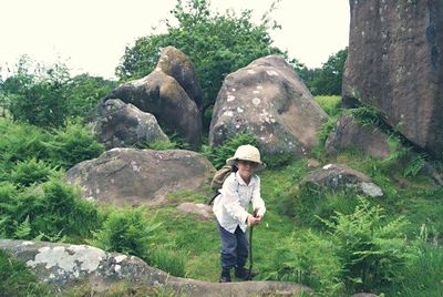 Man standing on rock formation