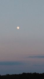 Scenic view of moon against sky at night