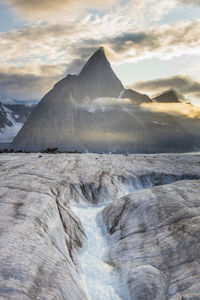 Glacier meting, creating river through ice below mt. loki