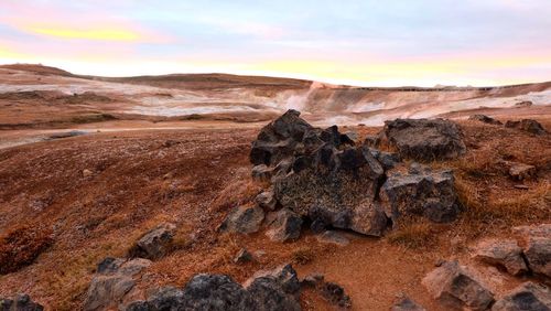 Rocks on shore against sky