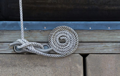 Close-up of rope tied on metal