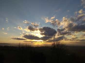 Scenic view of silhouette landscape against sky during sunset