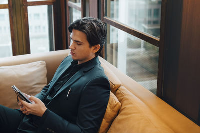 Young man using mobile phone