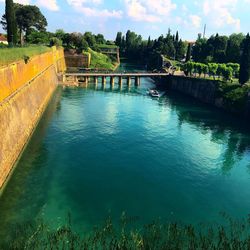 Scenic view of river against sky