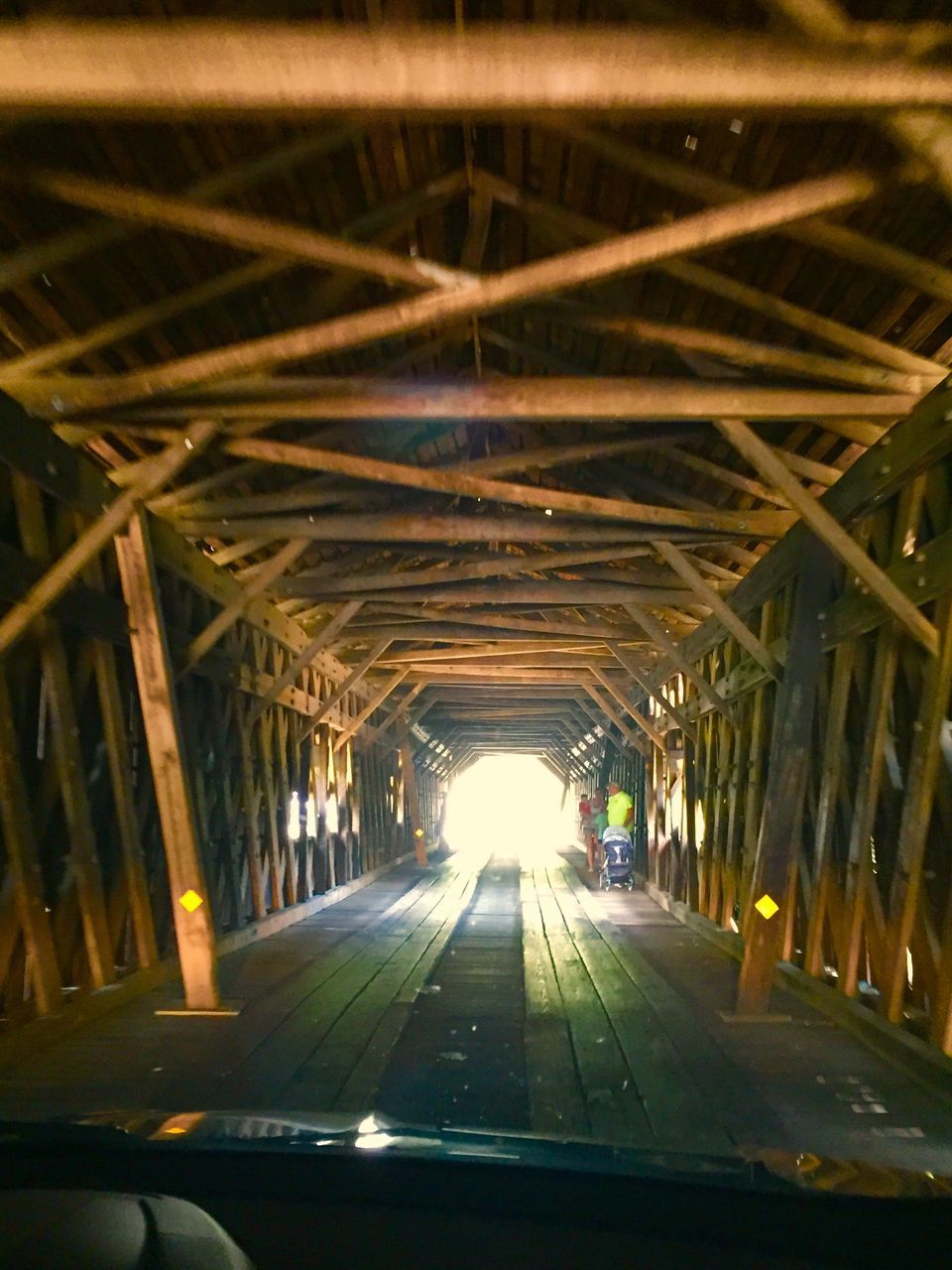 transportation, indoors, diminishing perspective, the way forward, illuminated, vanishing point, ceiling, built structure, night, no people, empty, connection, architecture, lighting equipment, road, long, metal, glass - material, in a row, tunnel