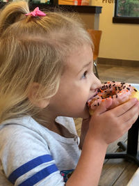 Portrait of woman eating ice cream