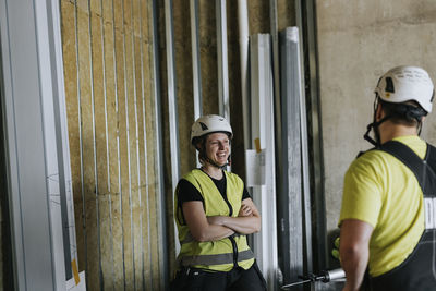 People talking at construction site