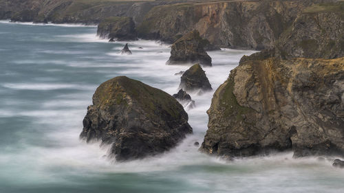 Scenic view of rocks in sea