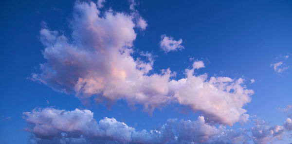 Low angle view of clouds in blue sky