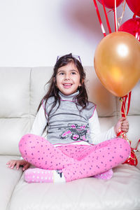 Portrait of smiling girl at home