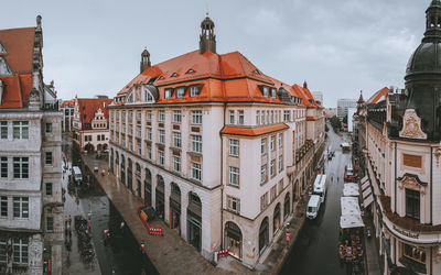 High angle view of street amidst buildings in city