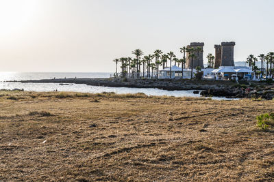 Scenic view of beach against clear sky