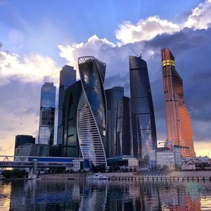 City skyline against cloudy sky