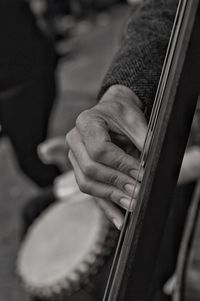 Midsection of man playing piano