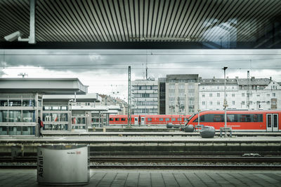 Train at railroad station in city