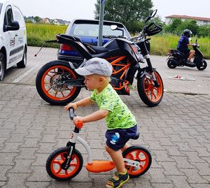 Boy riding bicycle