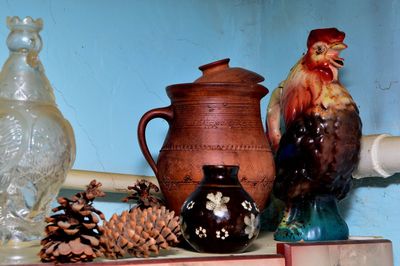 Close-up of food on table against wall