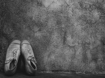 Low angle view of shoes on floor